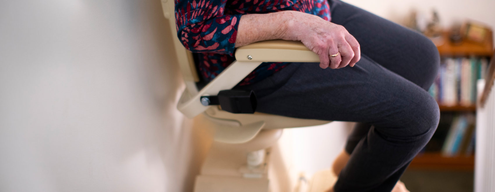 woman using stairlift